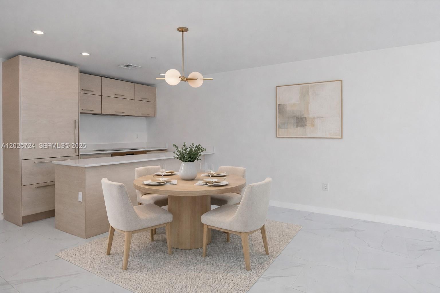 A dining area features a round wooden table, four upholstered chairs, and light-toned cabinetry — 1300 S Miami Ave # 3211, Miami FL 33130, MIAMI, FL