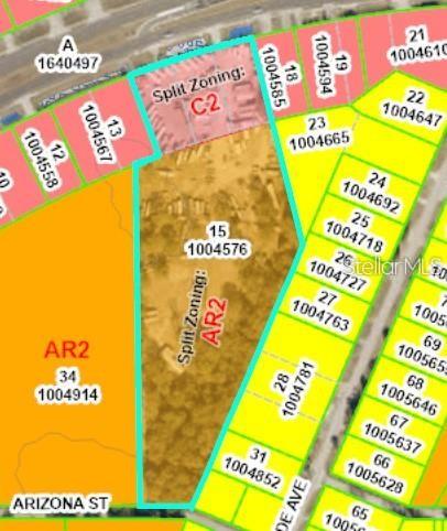 This is a property map showing a parcel with split C2 and AR2 zoning — 16076 CORTEZ BOULEVARD, BROOKSVILLE, FL