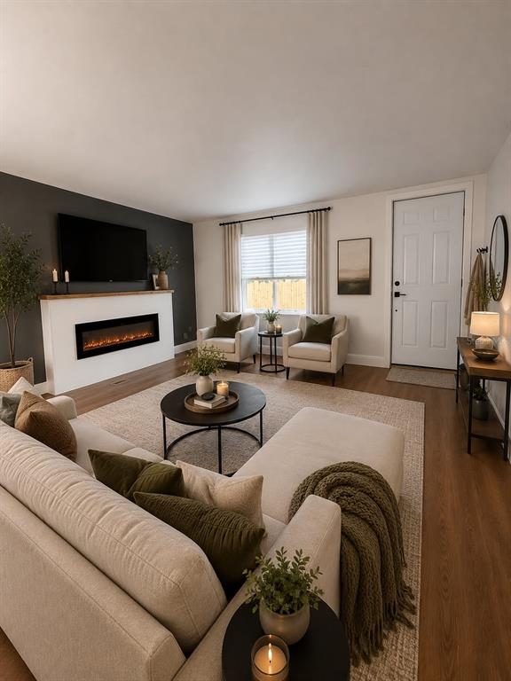 A living room features a fireplace, a television, two armchairs, and a sectional sofa — 1809 NE 162ND STREET, CITRA, FL