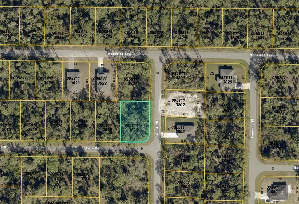 This is an aerial map showing a vacant lot highlighted in blue among residential properties — TAHITI STREET, NORTH PORT, FL