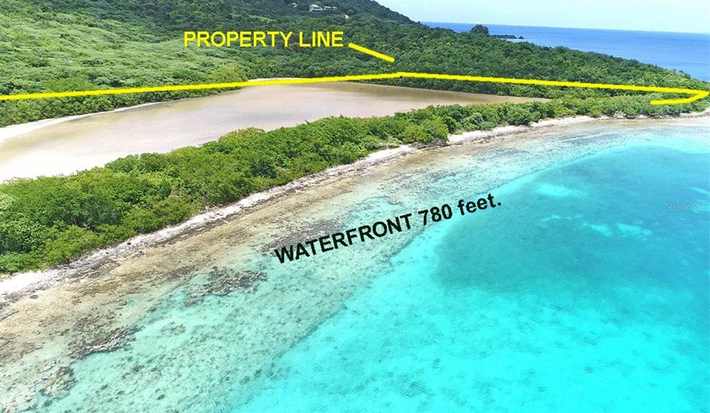 An aerial view shows a coastal property with a lagoon and 780 feet of waterfront — End of Road CAM PLAYA TAMARINDO, CULEBRA, PR