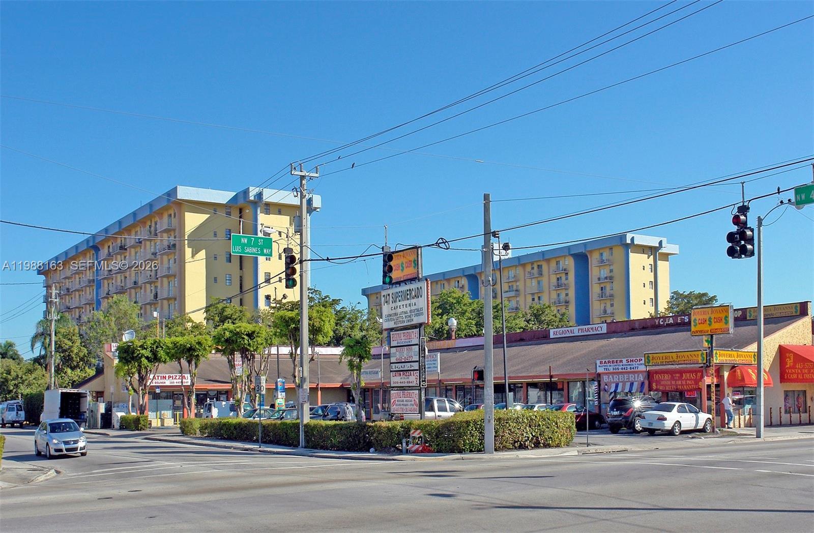 A street-level view shows a commercial strip mall with various storefronts and two apartment buildings — 4685 NW 7th St, Miami FL 33126, MIAMI, FL