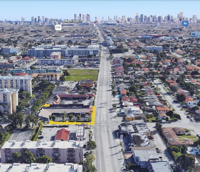 An aerial view shows a commercial building highlighted in yellow along a city street — 4685 NW 7th St, Miami FL 33126, MIAMI, FL