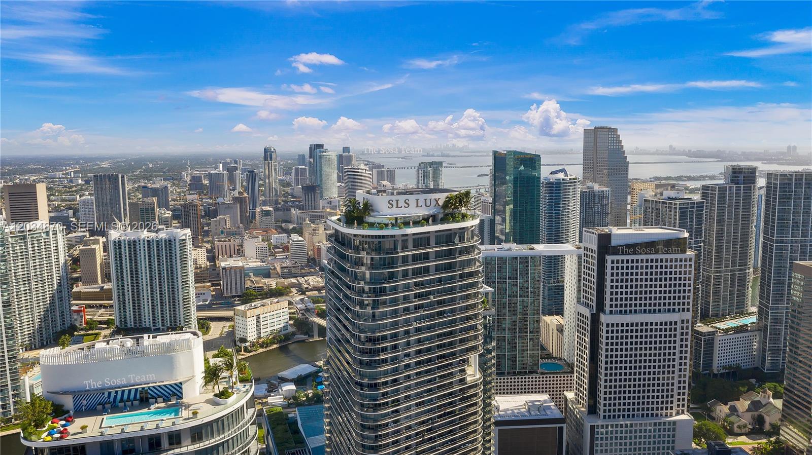 An aerial view of the Miami skyline featuring the SLS LUX tower and surrounding skyscrapers — 801 S Miami Ave # 3005, Miami FL 33130, MIAMI, FL
