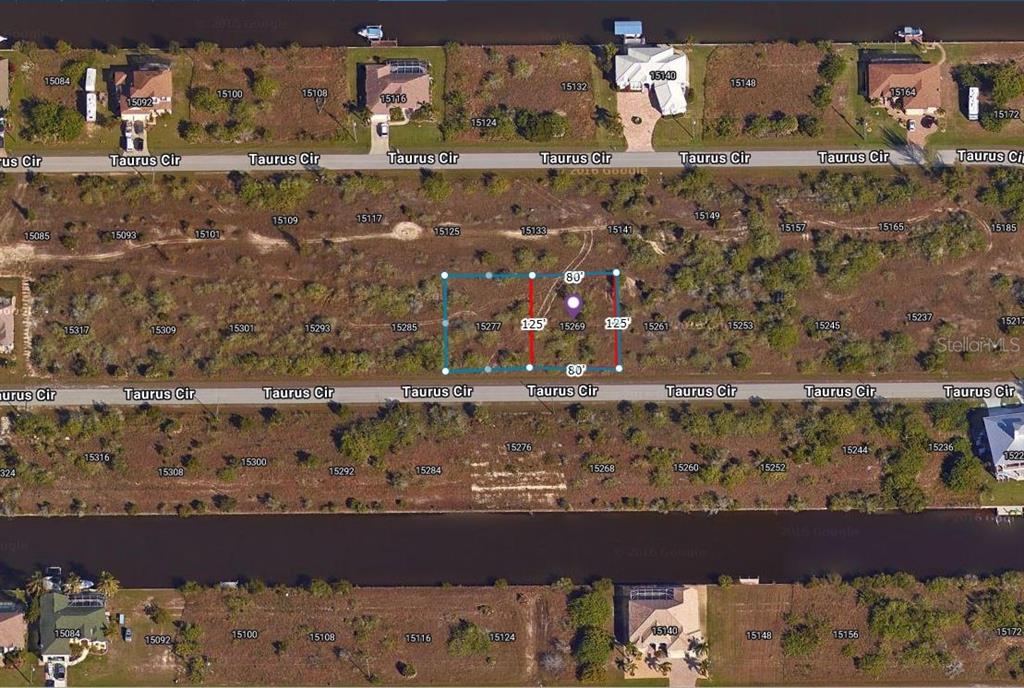 An aerial map shows a vacant rectangular lot highlighted on a residential street — 15269 TAURUS CIRCLE, PORT CHARLOTTE, FL