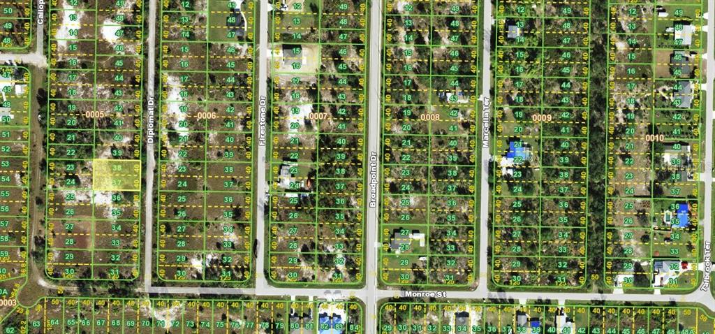 This is a satellite map view of a residential neighborhood with numbered land parcels — 2345 DIPLOMAT DRIVE, PUNTA GORDA, FL