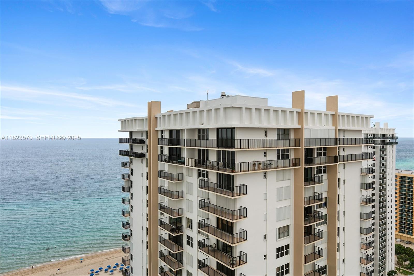 An exterior view of a high-rise oceanfront condominium building with multiple balconies — 2101 S Ocean Dr # 2707, Hollywood FL 33019, HOLLYWOOD, FL