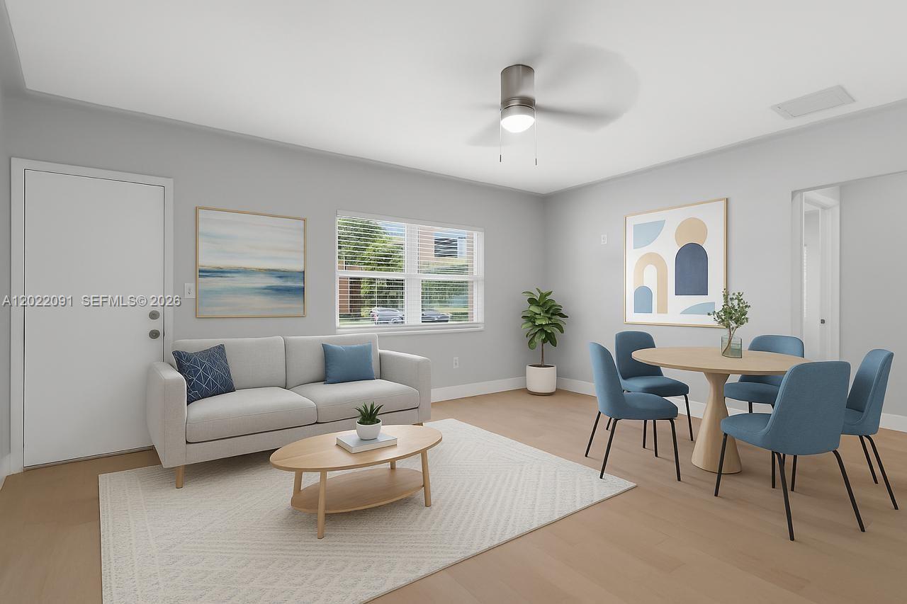 This is a digital rendering of a living and dining area with light wood floors — 351 NE 82nd St # 1, Miami FL 33138, MIAMI, FL