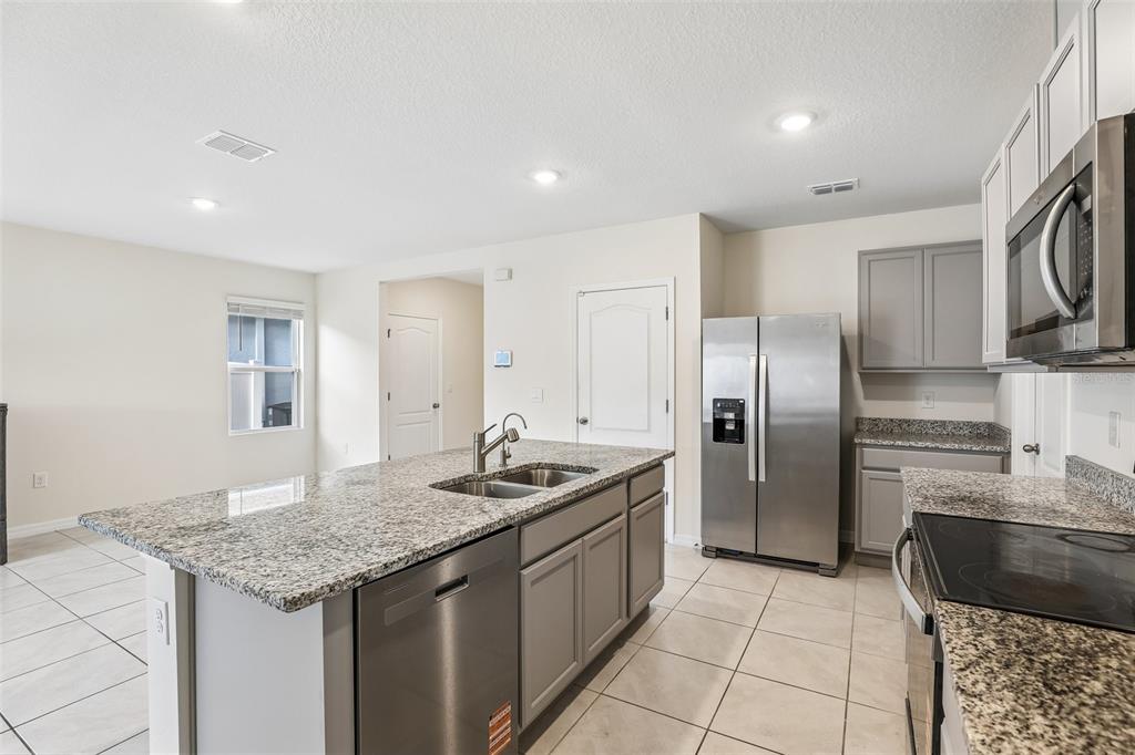 2945 ELIO HAMMOCK DR, HARMONY, FL — photo 4 of 23