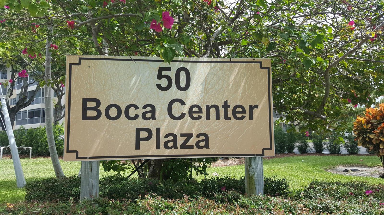A sign reading 50 Boca Center Plaza stands outdoors in front of a tree — 50 SW 3rd Avenue # 5080, Boca Raton FL 33432, BOCA RATON, FL