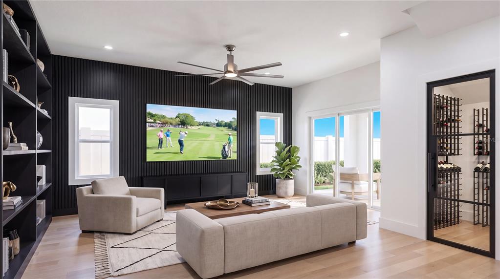 This living room features a black slatted accent wall, a television, and a glass-enclosed wine cellar — 2605 W CLEVELAND STREET, TAMPA, FL