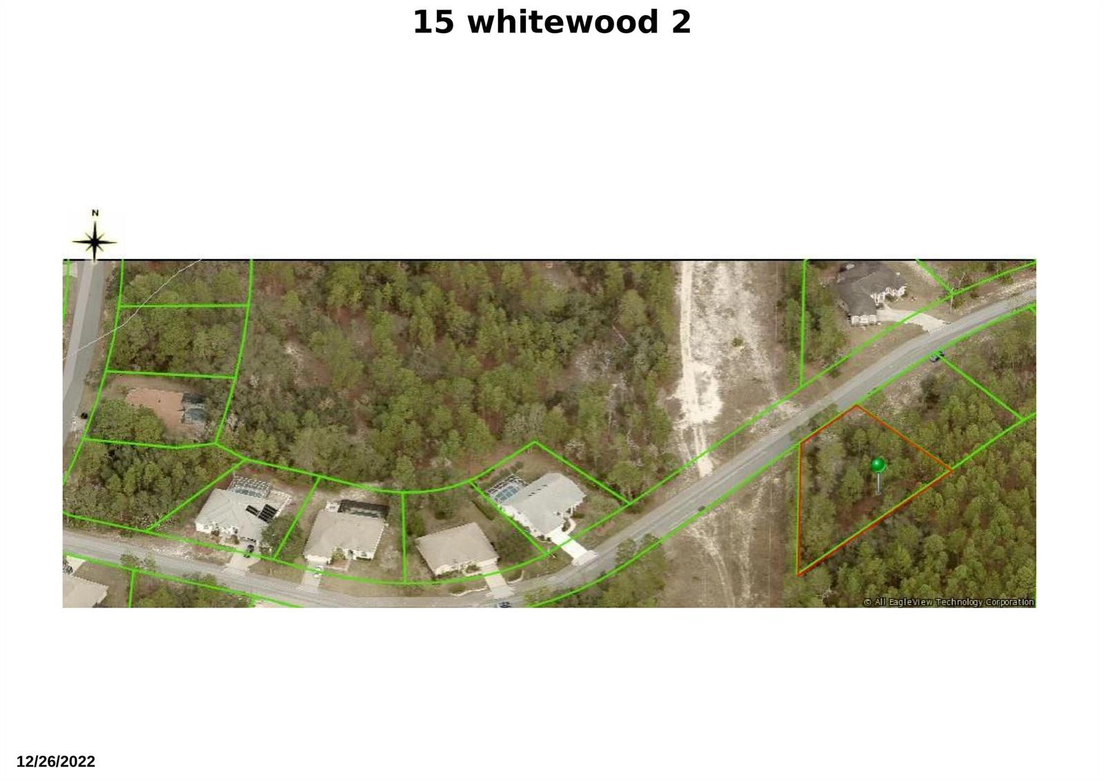 This aerial map shows a wooded residential lot outlined in red next to a road — 15 Whitewood Street, FL 34446, FL