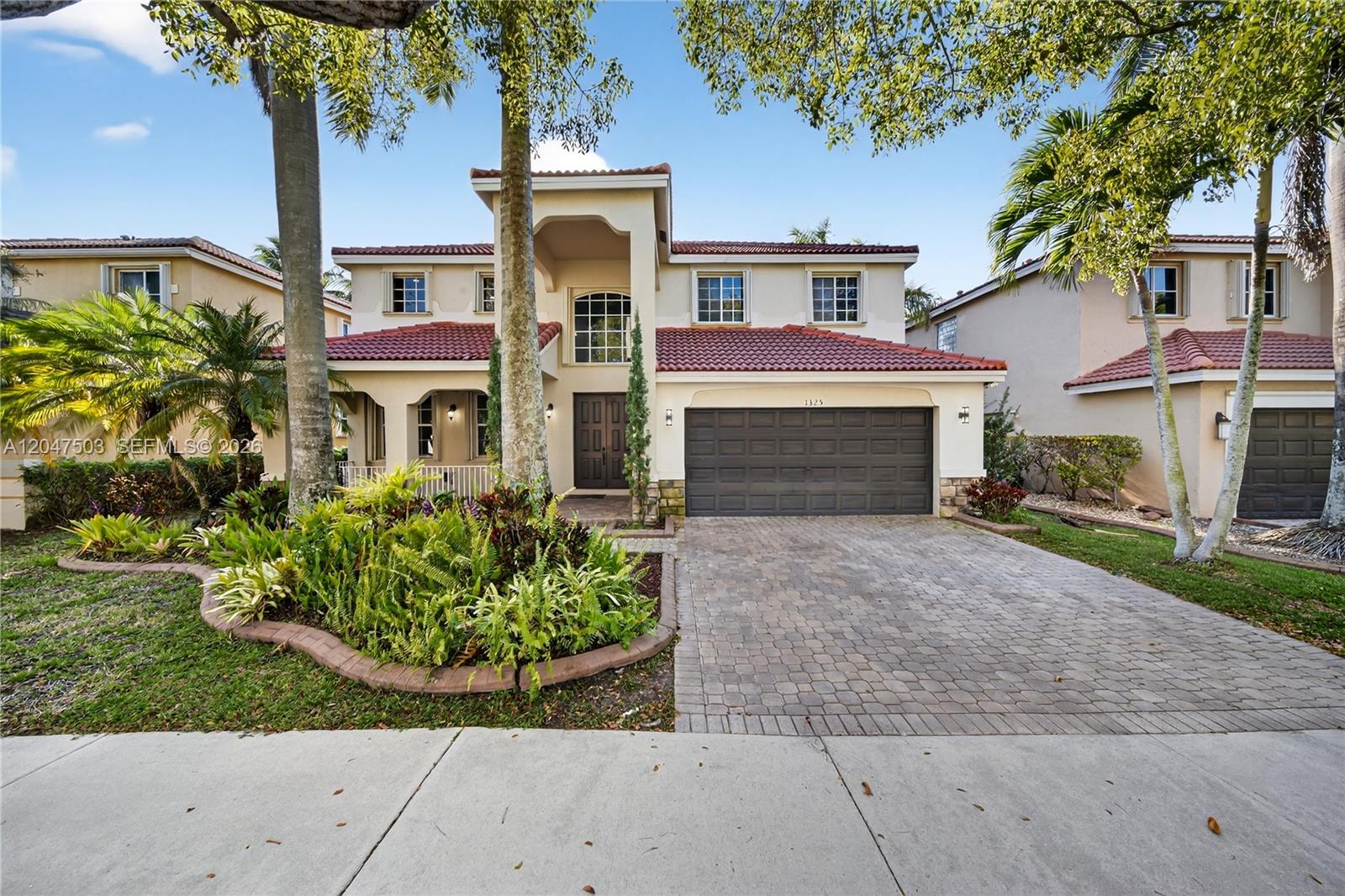 1325 Chenille Cir, Weston FL 33327