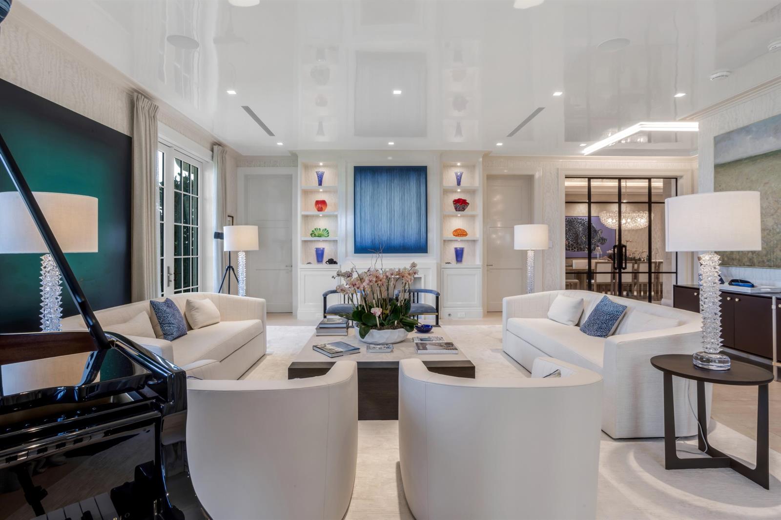 A formal living room features a grand piano, two sofas, armchairs, and a glossy ceiling — 456 S Ocean Boulevard, Palm Beach FL 33480, PALM BEACH, FL