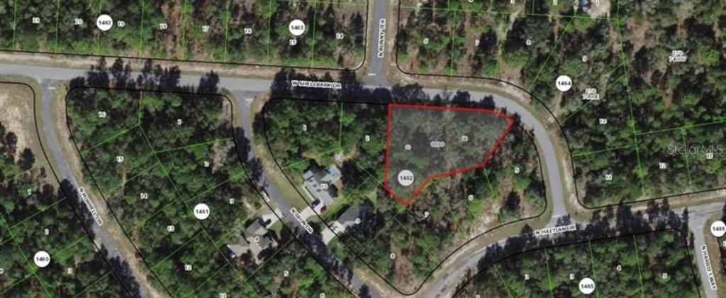 This is an aerial map view of a vacant residential lot outlined in red — 1968 W SHELLBARK DRIVE, CITRUS SPRINGS, FL
