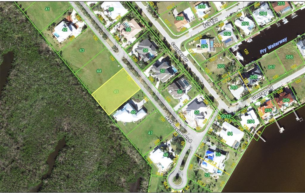 This is an aerial map showing residential lots and houses along Harborside Boulevard — 21421 HARBORSIDE BOULEVARD, PORT CHARLOTTE, FL