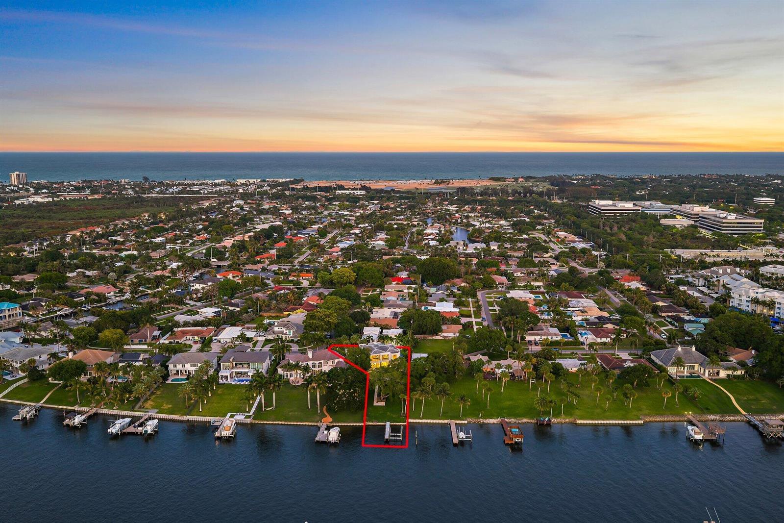 An aerial view shows a waterfront house with a private dock and red outline — 2162 Radnor Road, North Palm Beach FL 33408, NORTH PALM BEACH, FL