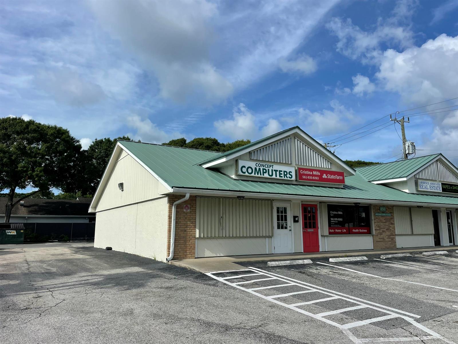 A commercial building with a green metal roof features a computer store and insurance office — 836 W Indiantown Road, Jupiter FL 33458, JUPITER, FL