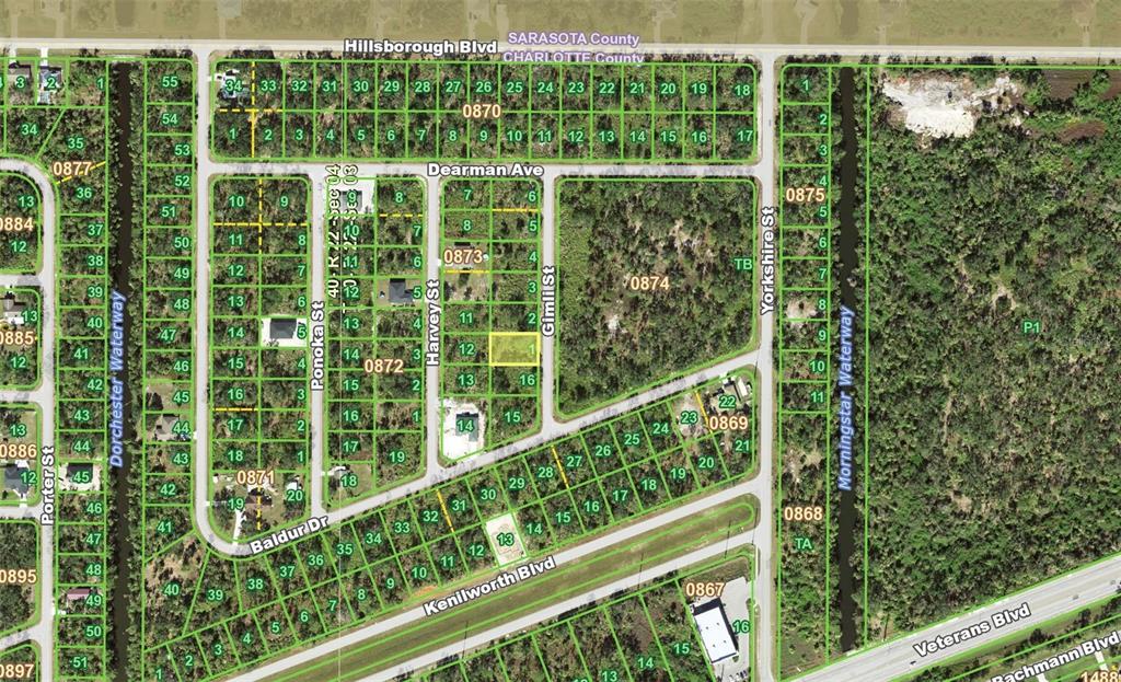 This is a satellite map showing residential land parcels and street layouts — 77 GIMLI STREET, PORT CHARLOTTE, FL