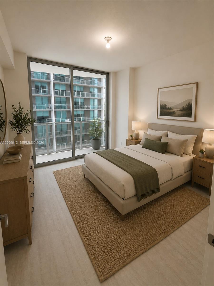 A bedroom features a bed, two nightstands, a dresser, and a balcony with city views — 77 SE 5TH ST # 1811, Miami FL 33131, MIAMI, FL
