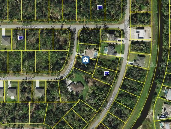 This is an aerial map showing residential lots, roads, and a house with a pool — JANARO ROAD, NORTH PORT, FL