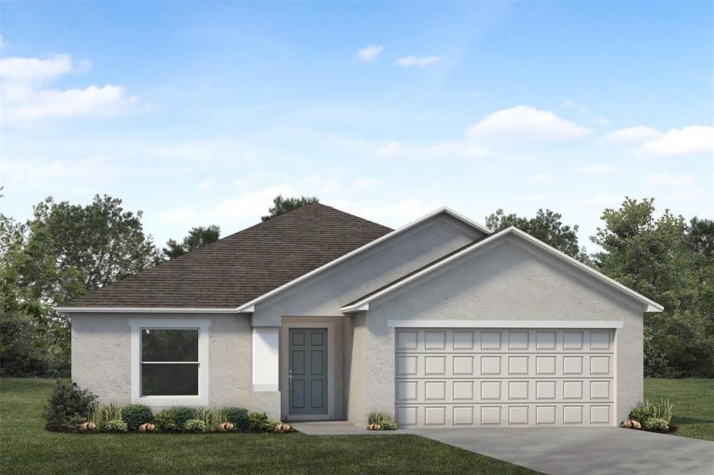 A kitchen with white cabinets, granite countertops, and stainless steel appliances opens to a living area — 3038 THORNHILL ROAD, WINTER HAVEN, FL