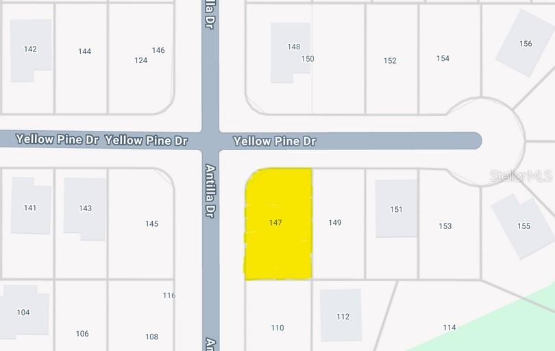 This is a map showing a highlighted corner lot at the intersection of two streets — 147 YELLOW PINE DRIVE, ROTONDA WEST, FL