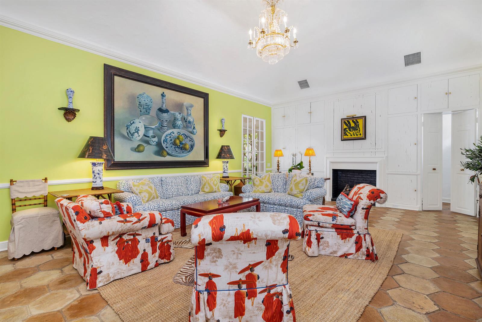 A living room features lime green walls, patterned furniture, a large still-life painting, and tile floors — 417 Peruvian Avenue # 1, Palm Beach FL 33480, PALM BEACH, FL