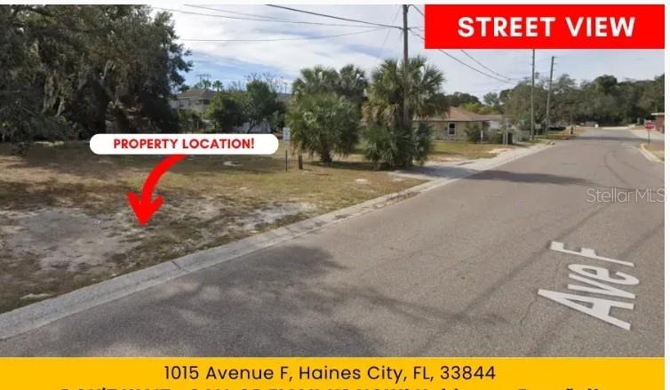 A vacant, grassy residential lot is situated along a paved street in a suburban neighborhood — 1015 AVENUE F, HAINES CITY, FL