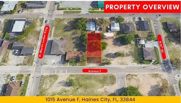 An aerial map view highlights a rectangular vacant lot located at a street intersection — 1015 AVENUE F, HAINES CITY, FL