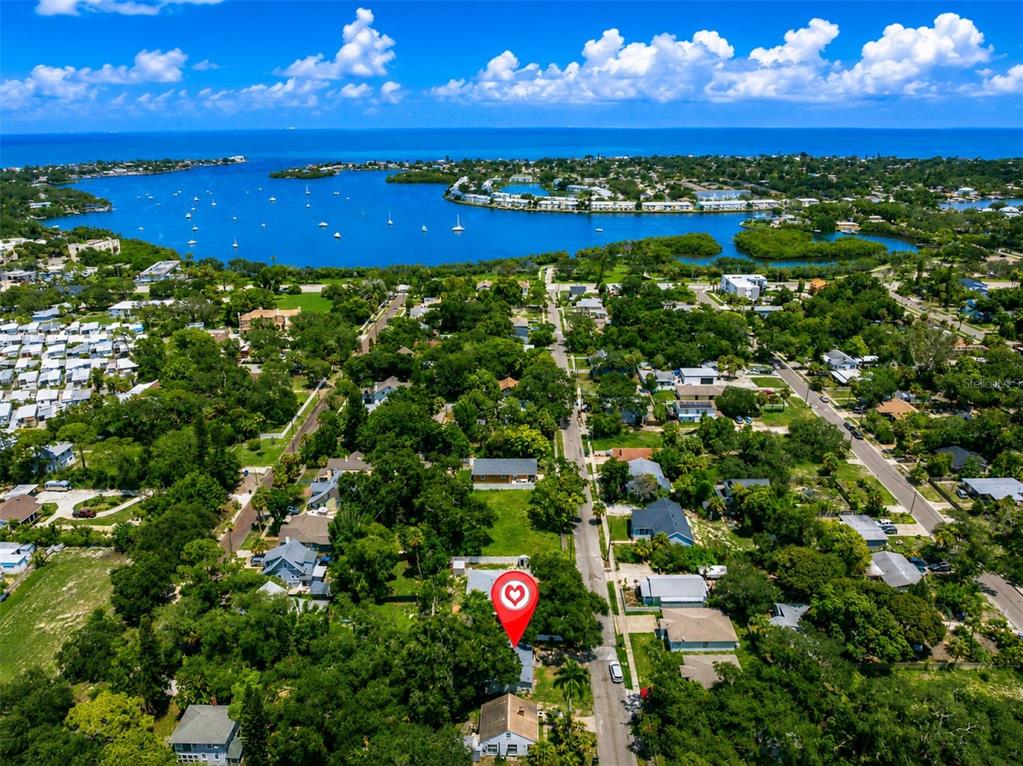 An aerial view shows a residential neighborhood with a red location pin on a house — 791 35TH AVENUE S, ST PETERSBURG, FL