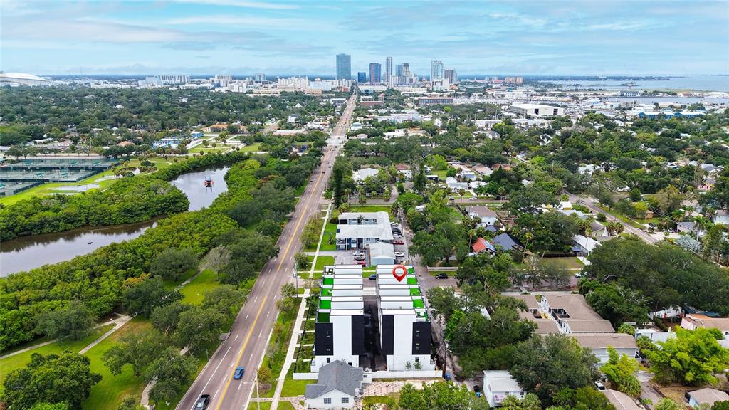 An aerial view shows a multi-unit residential complex with a red location pin — 2114 4TH STREET S UNIT 7, ST PETERSBURG, FL