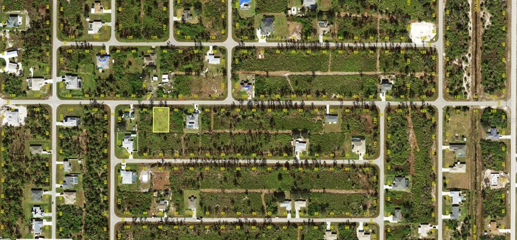 This is an aerial map view of a residential neighborhood with highlighted vacant land lots — 12089 DIVERSEY AVENUE, PORT CHARLOTTE, FL