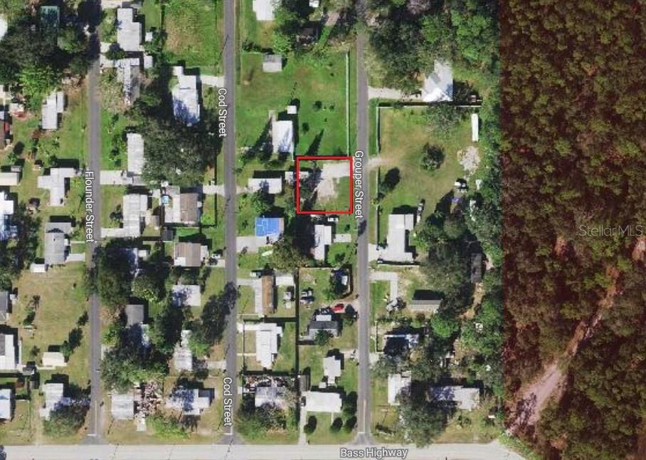 This is an aerial map showing a residential property highlighted in red on Grouper Street — 1640 GROUPER STREET, ST CLOUD, FL