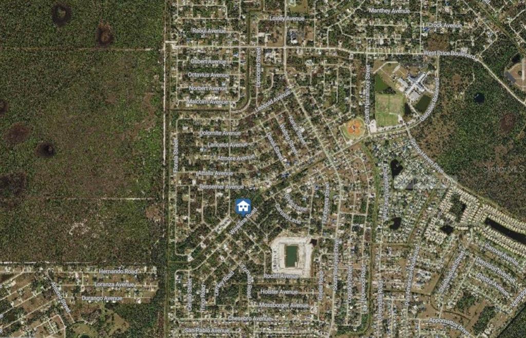 This is an aerial map showing a residential neighborhood with a highlighted property location — Lot#13 IRONDALE ROAD, NORTH PORT, FL