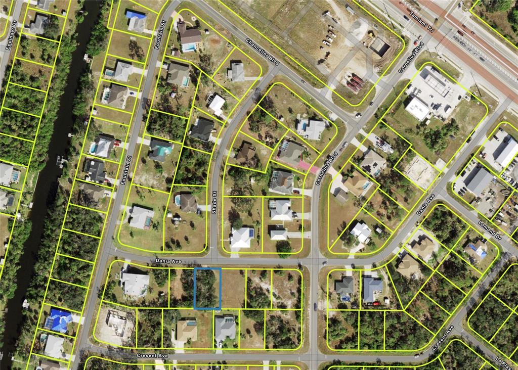 This is an aerial map showing a residential neighborhood with a highlighted vacant lot — 14505 DANIA AVENUE, PORT CHARLOTTE, FL