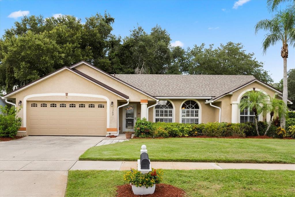 1702 SINGING PALM DRIVE