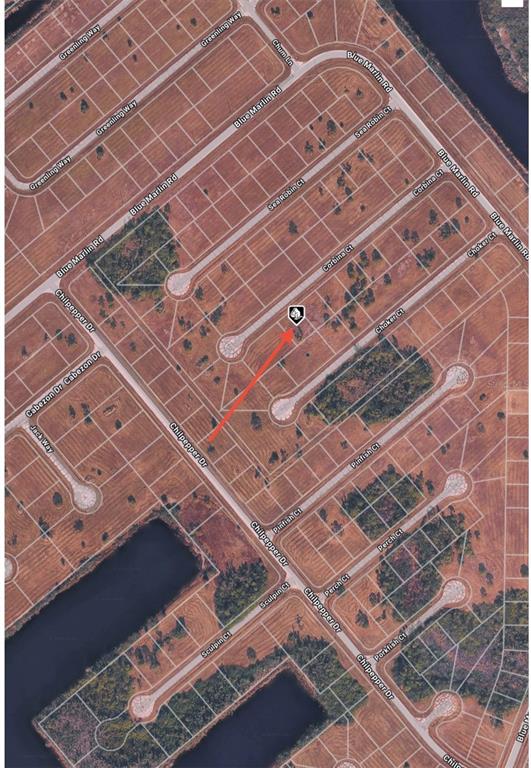 An aerial map view shows a vacant residential lot marked with a pin near Chilpepper Drive — 12394 CORBINA COURT, PLACIDA, FL