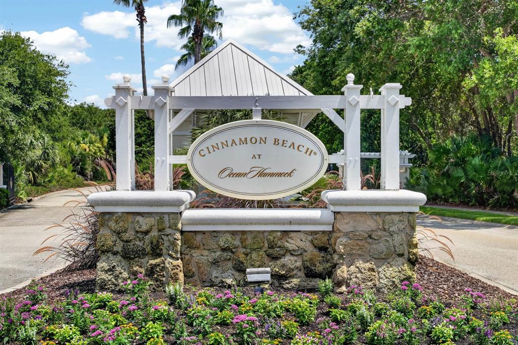 A stone and white wooden entrance sign for Cinnamon Beach at Ocean Hammock — 300 CINNAMON BEACH WAY UNIT 221, PALM COAST, FL