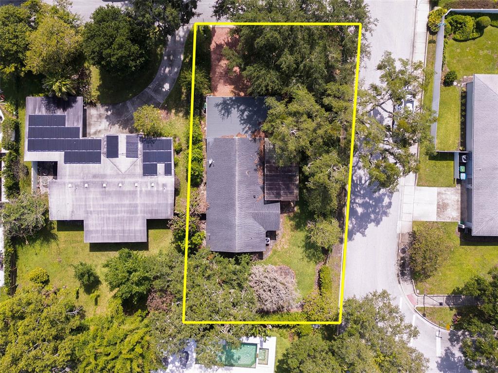 An aerial view shows a residential property with a house, trees, and a yellow boundary — 1361 AUDUBON ROAD, MAITLAND, FL