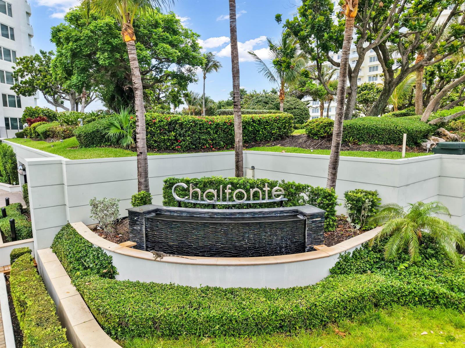 An exterior view of a Chalfonte sign with a water feature and a small lizard — 550 S Ocean Boulevard # 1906, Boca Raton FL 33432, BOCA RATON, FL