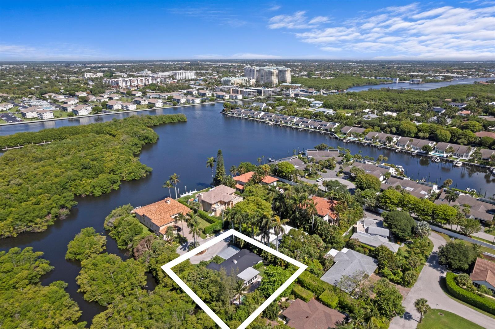 An aerial view shows a house highlighted by a white border surrounded by lush vegetation — 35 Anna Street, Boynton Beach FL 33435, BOYNTON BEACH, FL