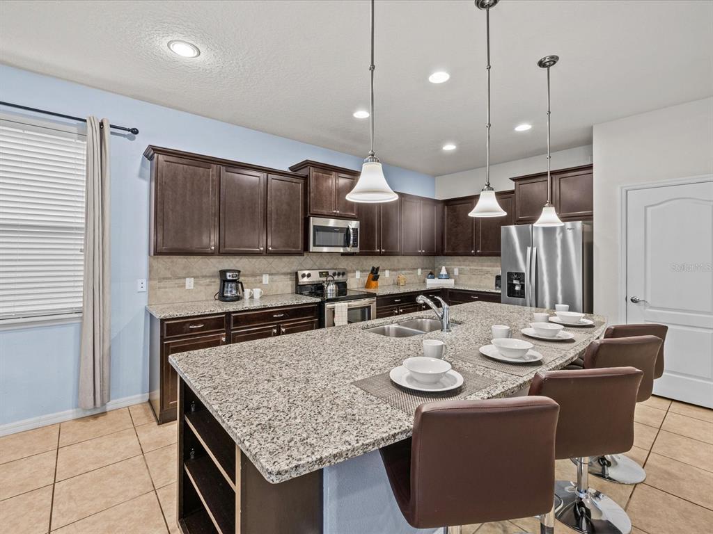 8832 MACAPA DRIVE, KISSIMMEE, FL — photo 5 of 30