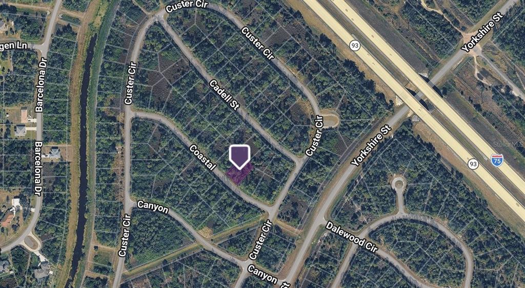 An aerial map view shows a highlighted vacant residential lot located near a highway — Lot 15 COASTAL STREET, NORTH PORT, FL