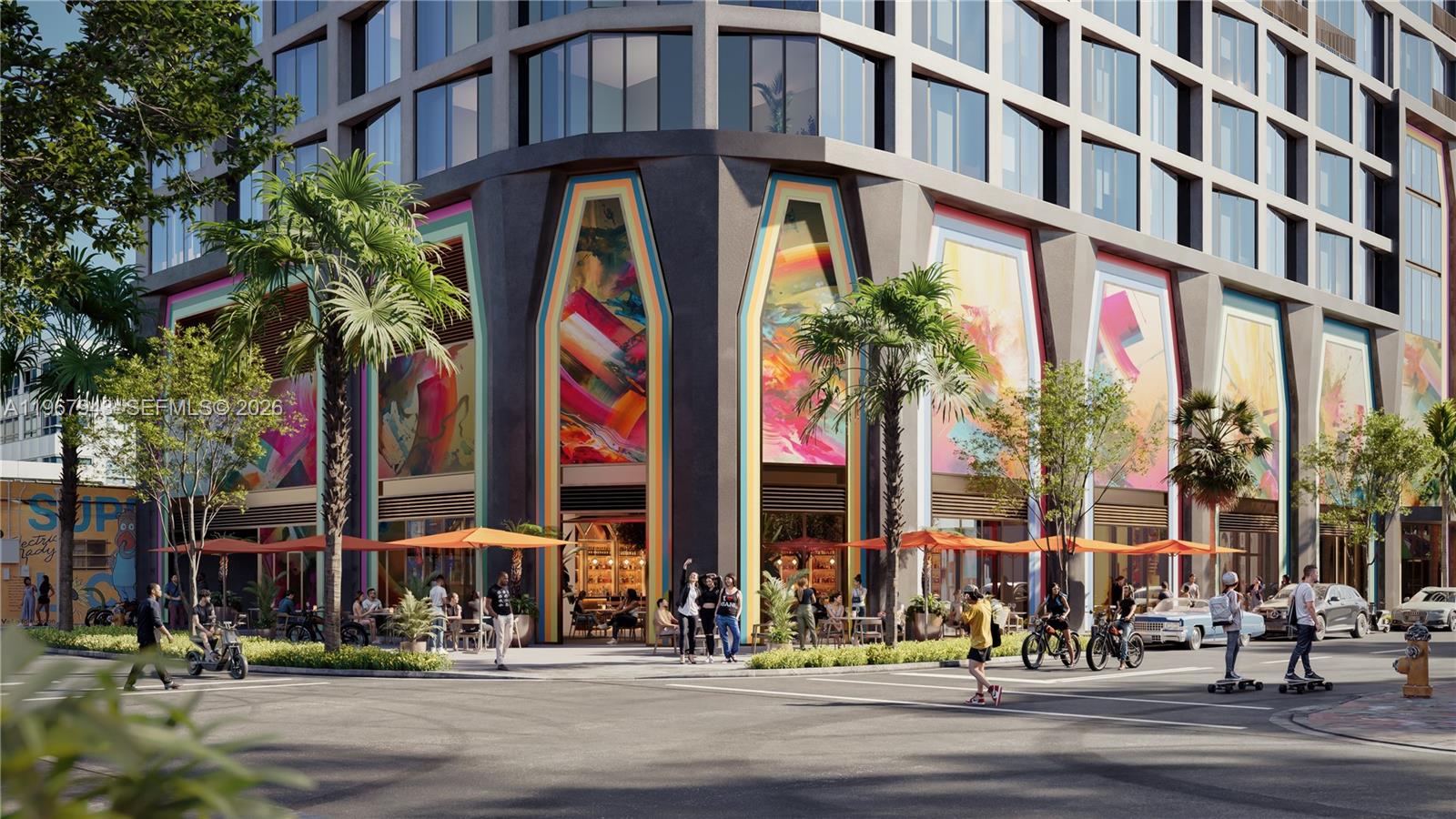 This is a rendering of a modern building exterior featuring colorful murals and outdoor seating — 2215 NW 1st Place # 704, Miami FL 33127, MIAMI, FL