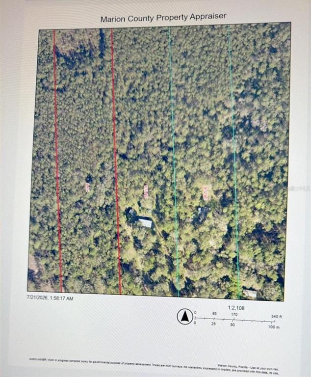 This map shows a property parcel highlighted with a red house icon on a road — 0 NE 132ND PL, CITRA, FL