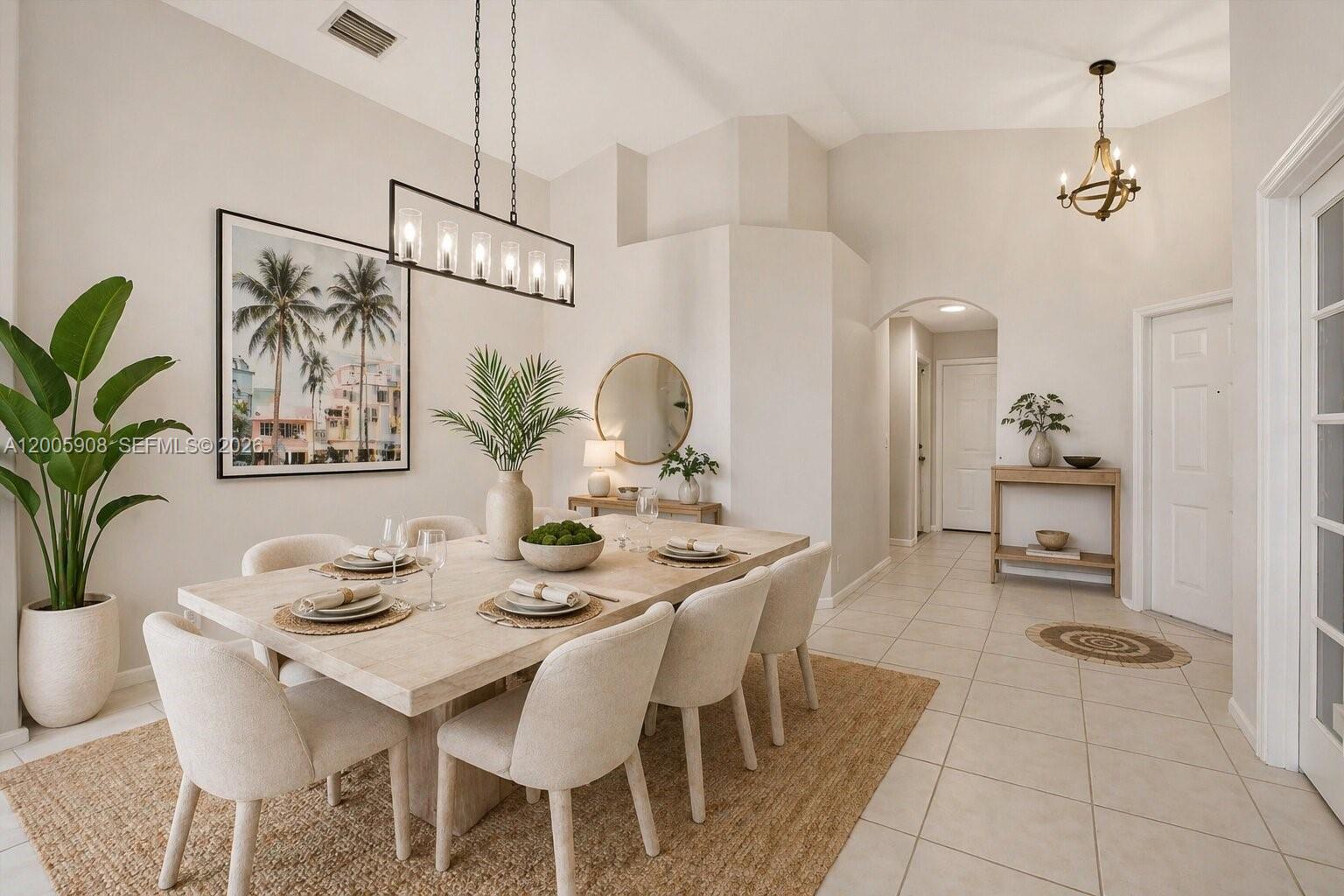 A dining room features a light wood table, upholstered chairs, and a rectangular pendant light — 6298 Harbour Chase Dr, Lake Worth FL 33467, LAKE WORTH, FL