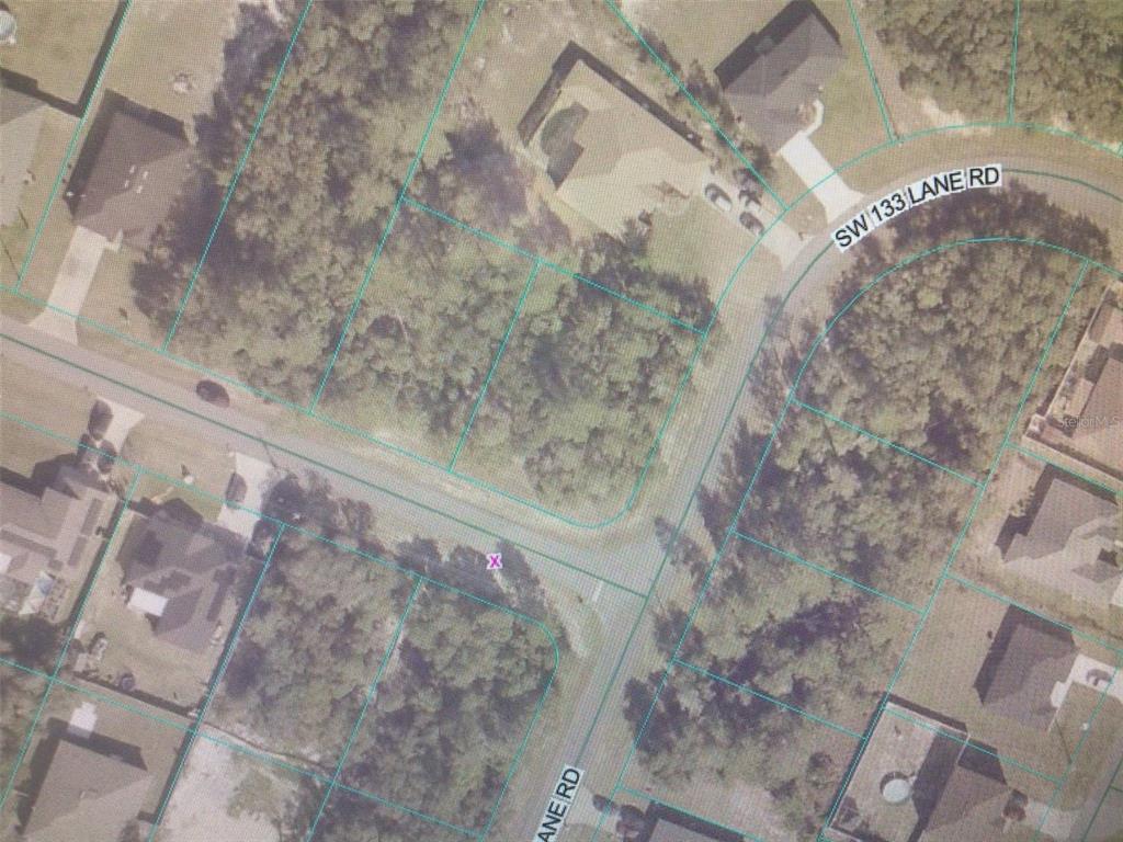 This is an aerial map showing a vacant residential lot at a street intersection — 0 SW 29 CIRCLE, OCALA, FL