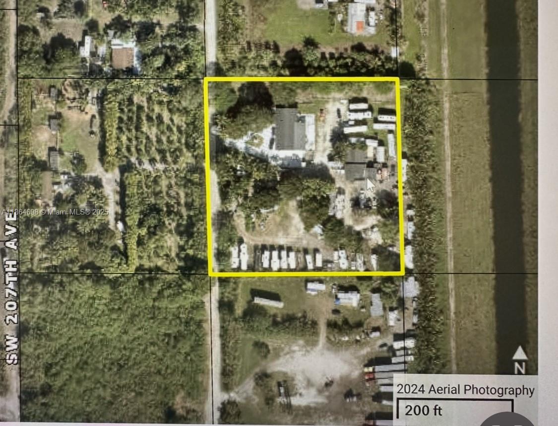 An aerial map view shows a rectangular property lot containing a house and multiple vehicles — 15765 SW 206th Ave, Miami FL 33187, MIAMI, FL