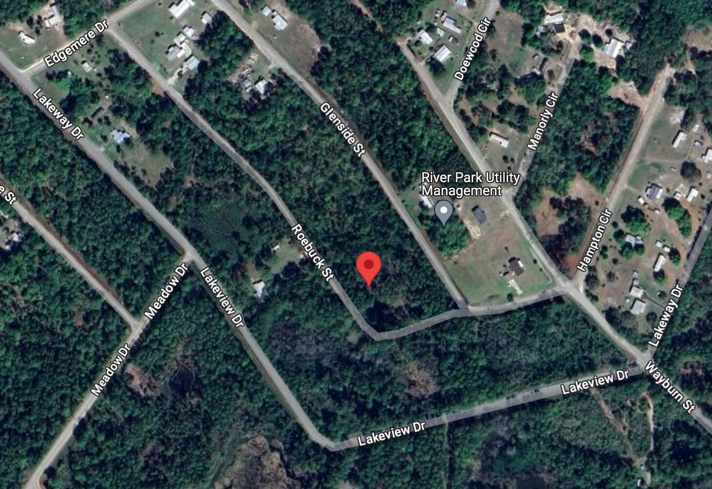 This is a satellite map view of a wooded residential area with several streets — 000 Roebuck Street, FL 32139, FL